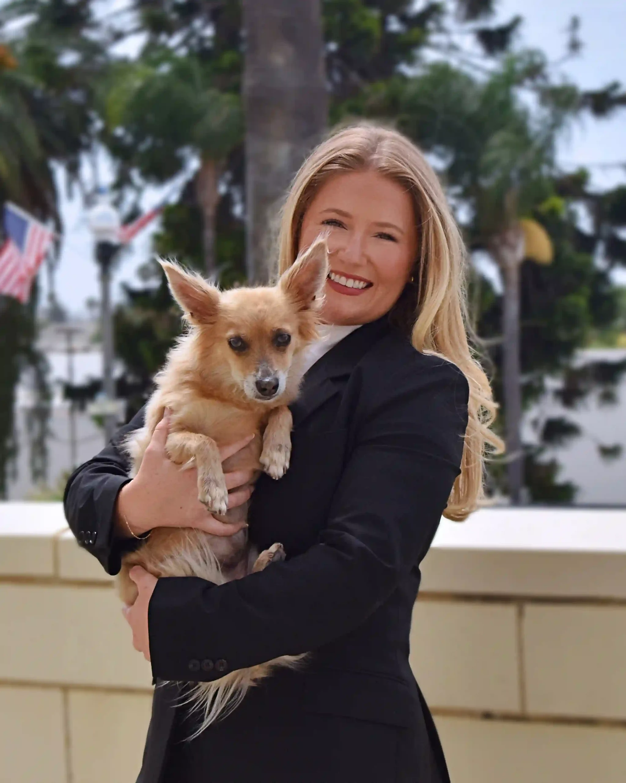 Siena M. Martinez holding her dog, Tulip